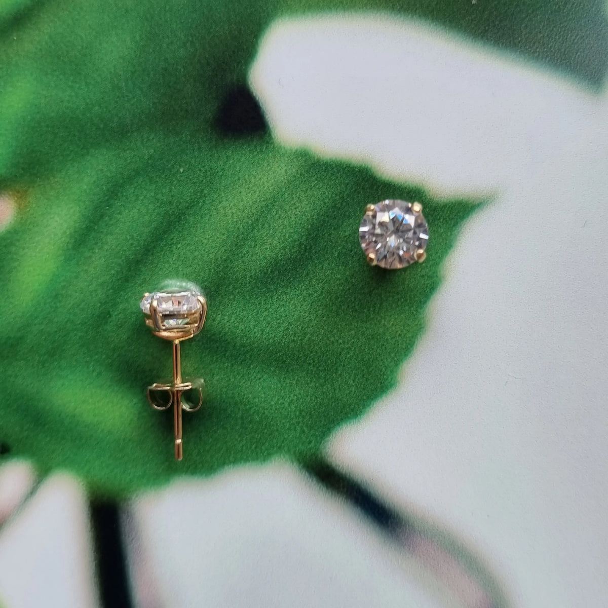 ER7066 - EAR CZ STUD ROUND CLA - 9CT YELLOW GOLD
