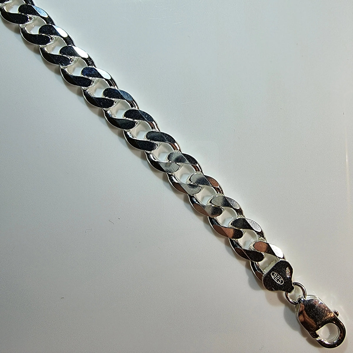 S0544 - CHAIN CURB GENTS FLAT DC BRACELET - SILVER