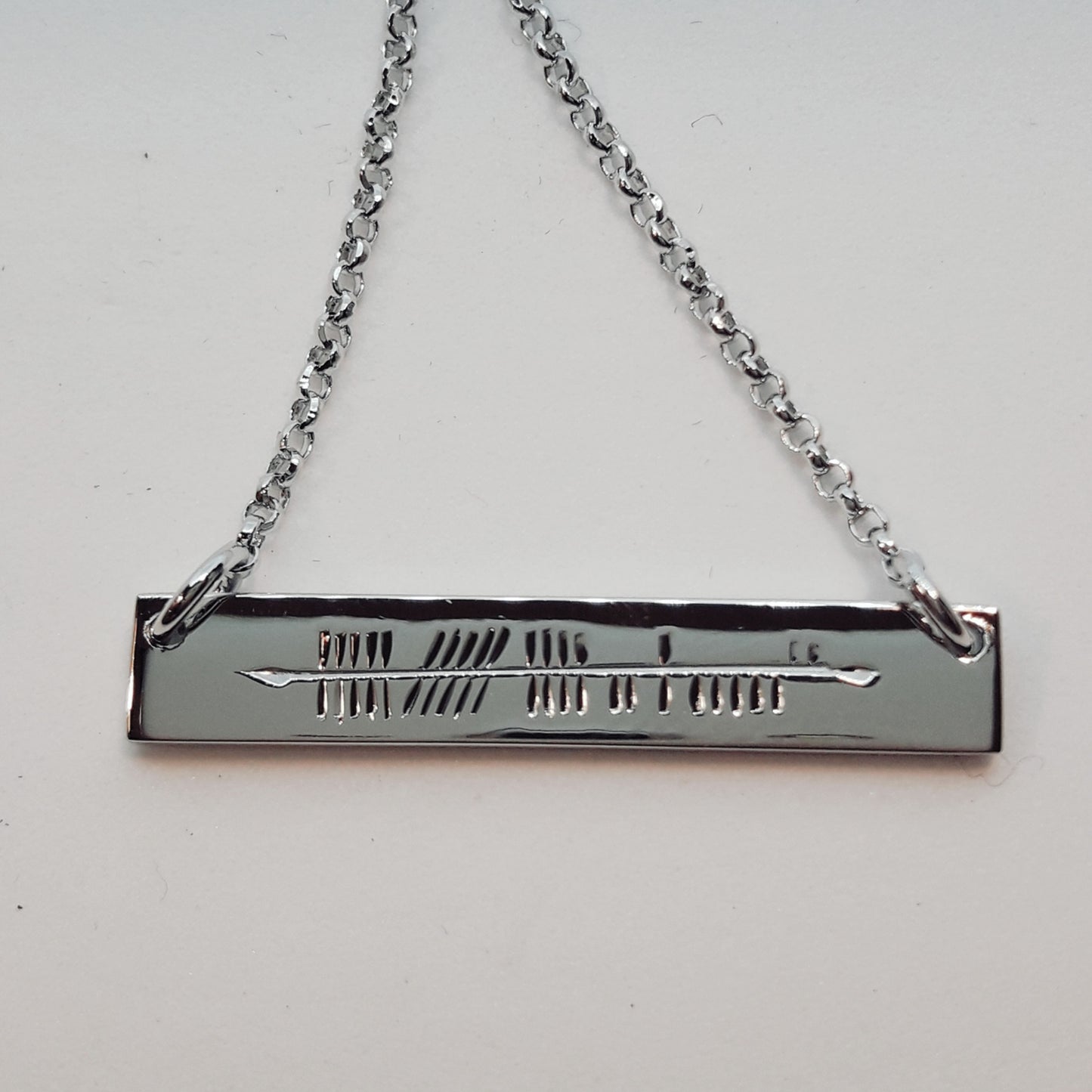 SCP216 - PEND OGHAM HORIZONTAL IRELAND INGOT