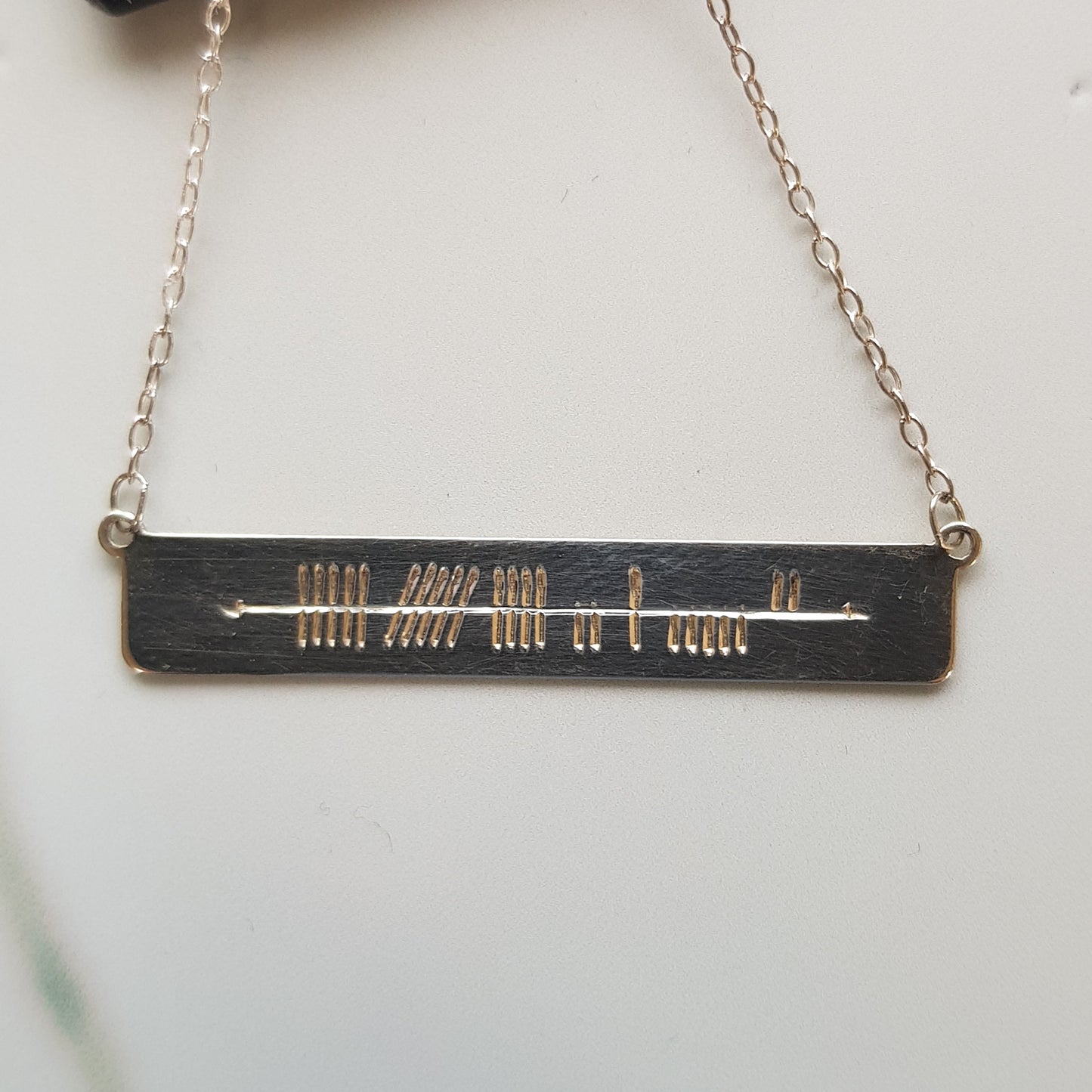 SCP178 - PEND OGHAM HORIZONTAL IRELAND INGOT